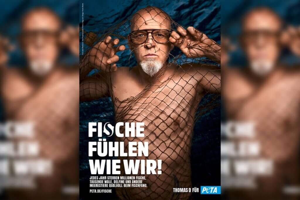 Thomas D im Fischernetz gefangen als PETA-Motiv